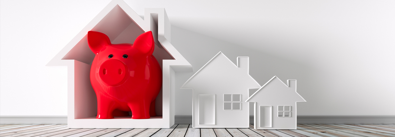 Grafische Darstellung - rotes Sparschwein steht in einem Haus.